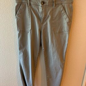 Size 6 Democracy brand with the  Ab-solution. Khaki color with fringe bottoms!